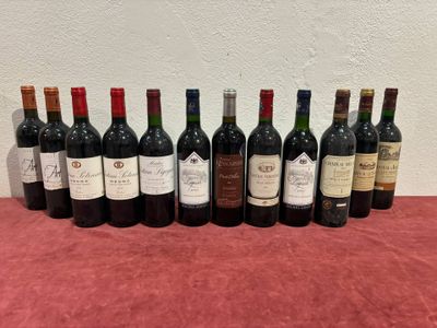 a group of bottles of wine sitting on top of a table
