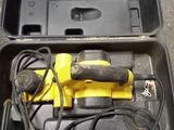 a box with tools in it sitting on the ground
