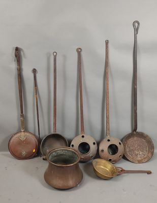 many different types of kitchen utensils and spoons