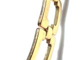 a black purse with a gold chain hanging from it