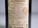 a label on a bottle of wine on a table