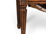 an old wooden chair with upholstered upholstered upholstered seat