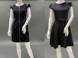 two mannequins dressed in black dresses with zippers on them