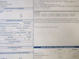 un document sur lequel figure la photo d'une voiture