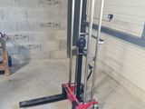 a picture of a forklift in a garage