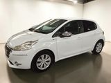 a white car is parked in a large room