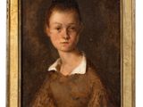 portrait of a young boy in a brown dress by person