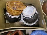 a box full of different types of bowls and containers