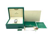 an image of a watch in a green box with a watch in it