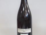 a bottle of wine that is sitting on a table