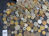 a box full of coins on a table with a price tag