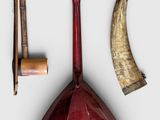 a red helmet with horns, a hammer, a hammer, and a knife