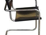an image of a black and chrome chair on a white background