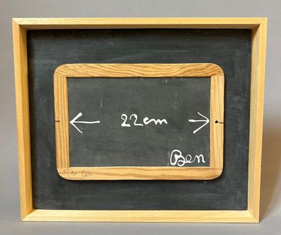 a blackboard with a wooden frame and a chalk board with an arrow pointing to the left