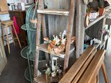 an old ladder leaning against a wall in a shop