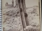 an old photo of a train going over a bridge in the desert