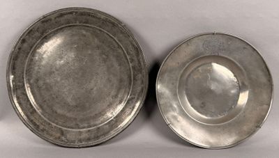 pair of silverplated dishes on a white background