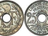 a close up of a coin with a picture of a bird on it