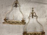 pair of antique brass candlesticks with glass holders