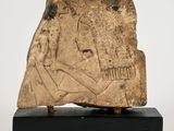 an image of a stone block with a face on it