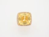 a yellow sapphire and diamond ring