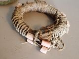 a rope wrapped around a ring on a table