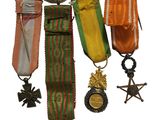 a group of medals hanging from a string