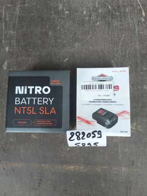 une photo montrant une boîte de piles Nitro à côté d'un paquet de piles