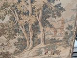 a picture of a tapestry hanging on a wall
