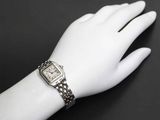 someone is wearing a watch on their wrist on a mannequin hand
