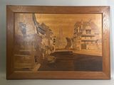 une image d'un tableau sur le mur d'une maison
