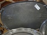 many different pans and pans sitting on a table