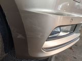 a close up of the front bumper of a car