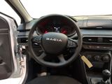 the interior of a car with a steering wheel and dashboard controls