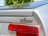 a close up of a car ' s tail light and license plate