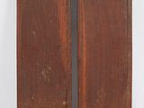 pair of antique wooden bookends on a white background