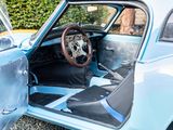 a blue car with a steering and a steering wheel