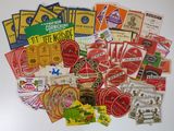 many different types of stickers and labels on a white surface