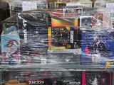 a lot of toys on the shelf in the store