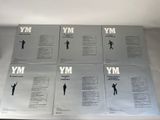 six vinyl albums of various people standing on a white surface