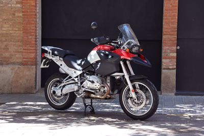 a motorcycle parked in front of a garage door