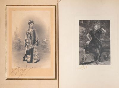 an old photo of a man and a woman standing next to each other