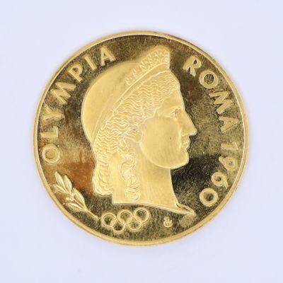 l'image d'une pièce d'or sur laquelle figure une tête de femme