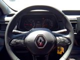 the steering wheel of a car with a steering wheel and dashboard controls
