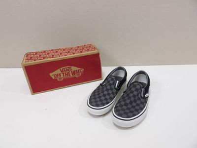Chaussures Vans Slip-On à motif damier noir et blanc
