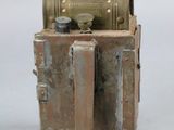 a small metal object that is sitting on top of a table