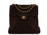 a chanel brown sued shoulder bag with gold hardware
