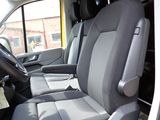 a seat in the back of a van that is empty