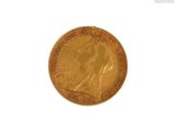 une image d'une pièce d'or sur fond blanc
