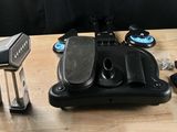 a table with a pair of pedals and a pair of scissors